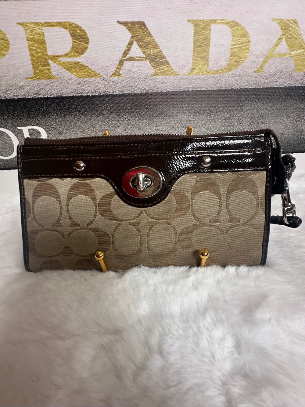 Coach Penelope zippy turn Lock signature Canvas and Dark Brown Patent Leather